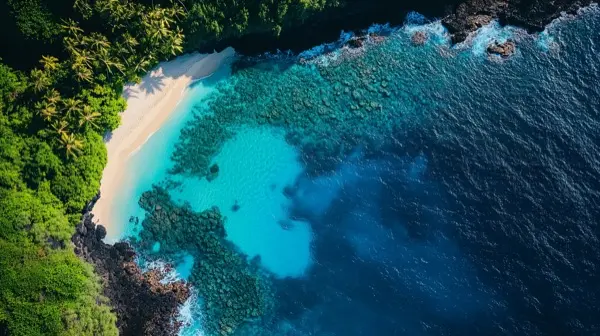 Aerial drone view of Hawaiian coastline with crystal turquois
